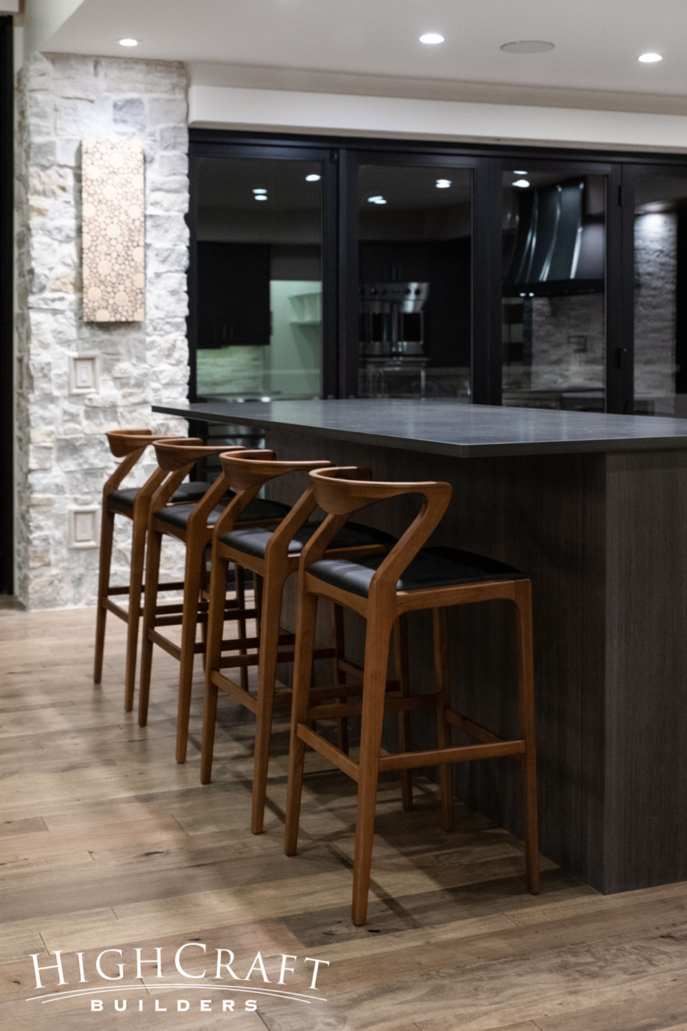 Soft-Contemporary-Custom-kitchen-raised-bar-stone-wall