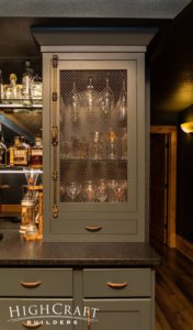 basement-finish-fort-collins-speakeasy-wet-bar-cabinetry-close-up-metal-mesh-screen