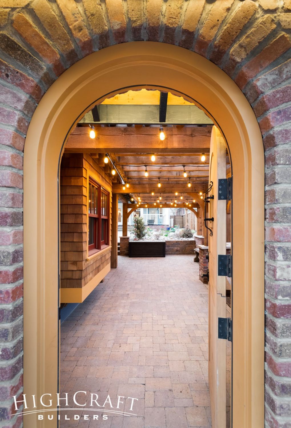 english-cottage-garage-arched-dutch-door-brick-arch