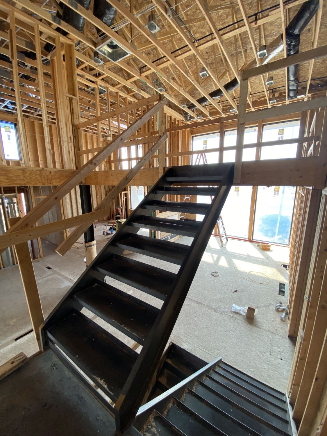 custom-home-construction-framing-metal-stairs