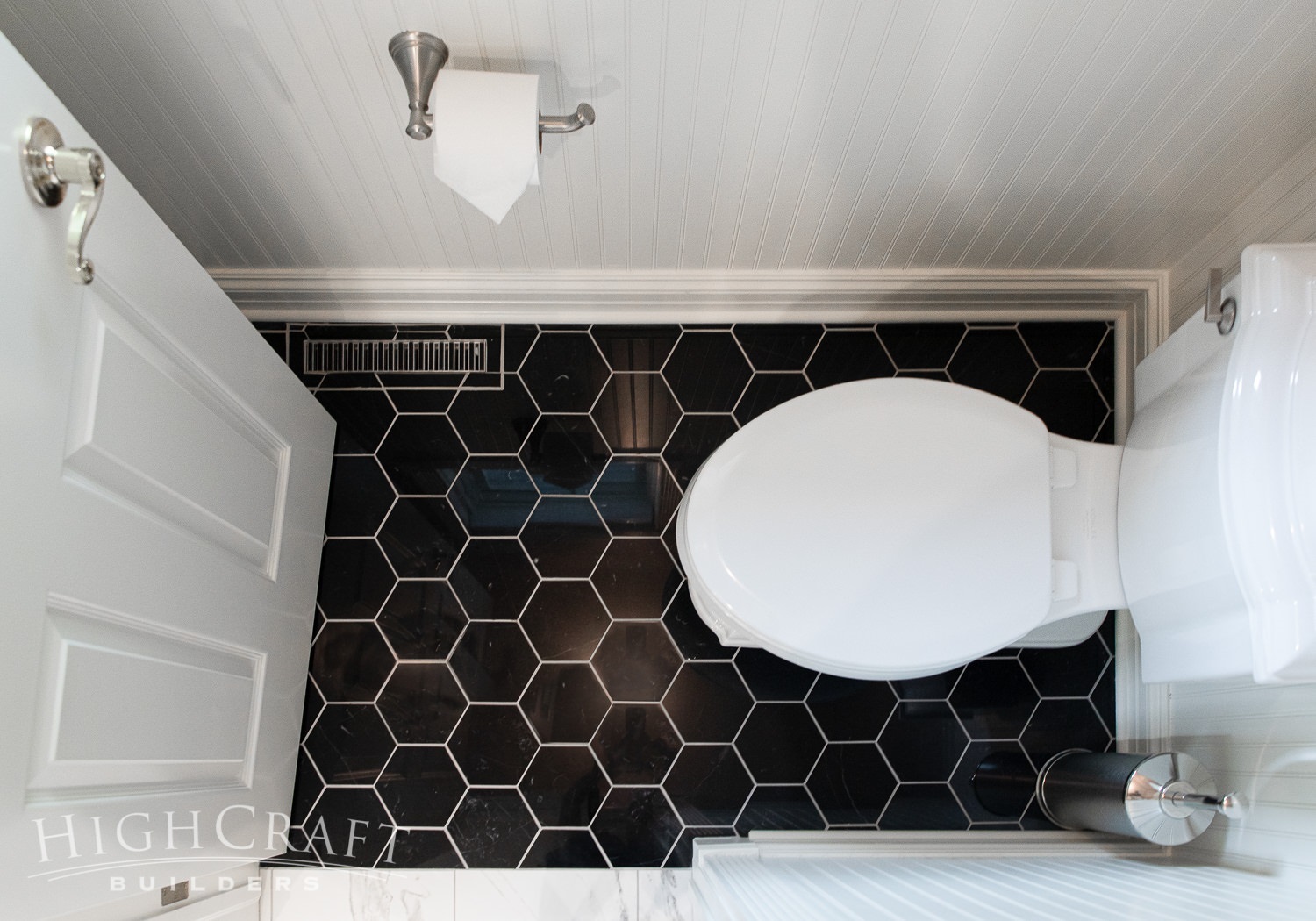 traditional-master-bath-remodel-black-hex-tiles-commode