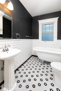 whole_house_remodel_main_bathroom_remodeling_clawfoot_tub_hex_tile_flooring_sink