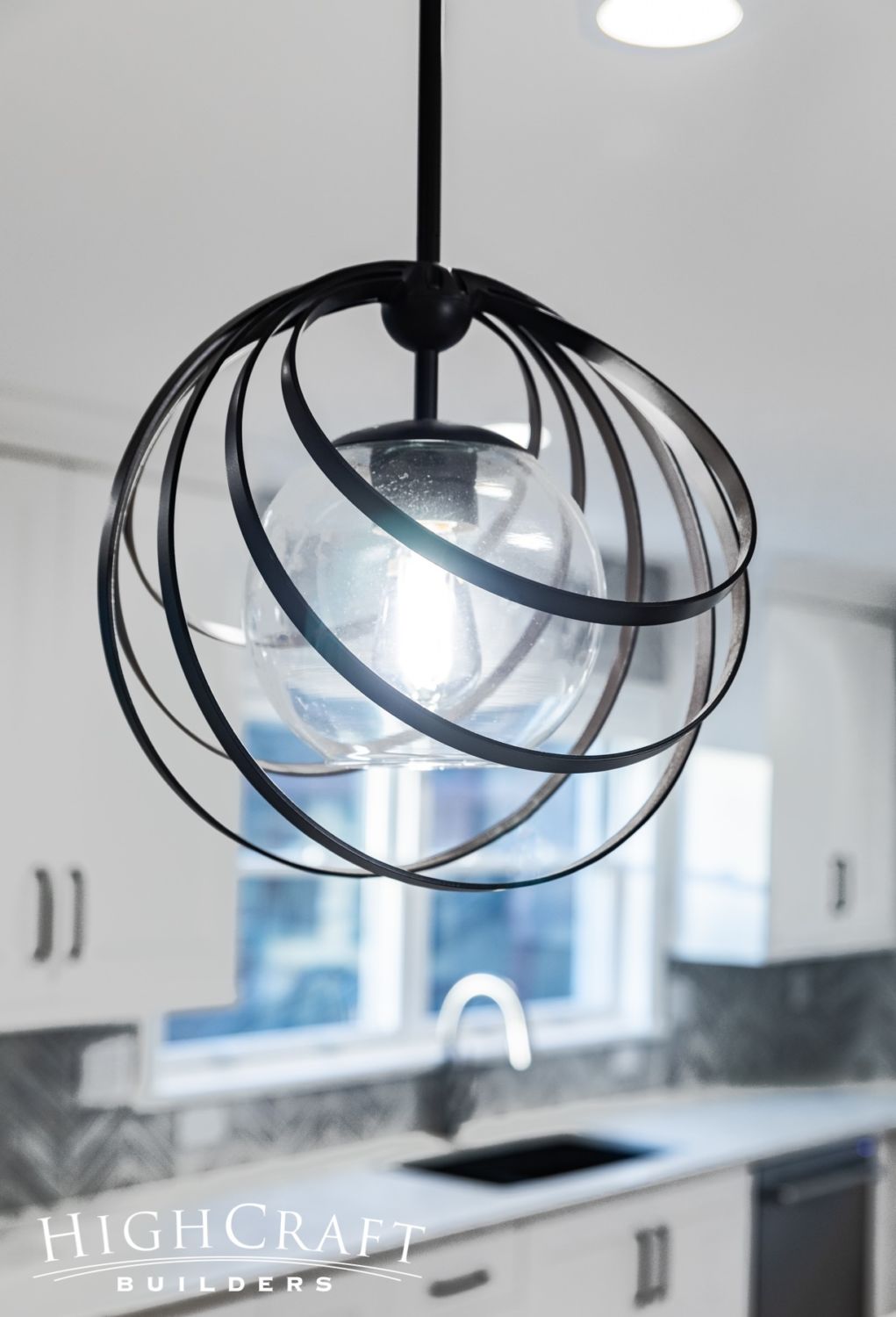 kitchen-remodel-modern-black-metal-cage-pendant-lighting