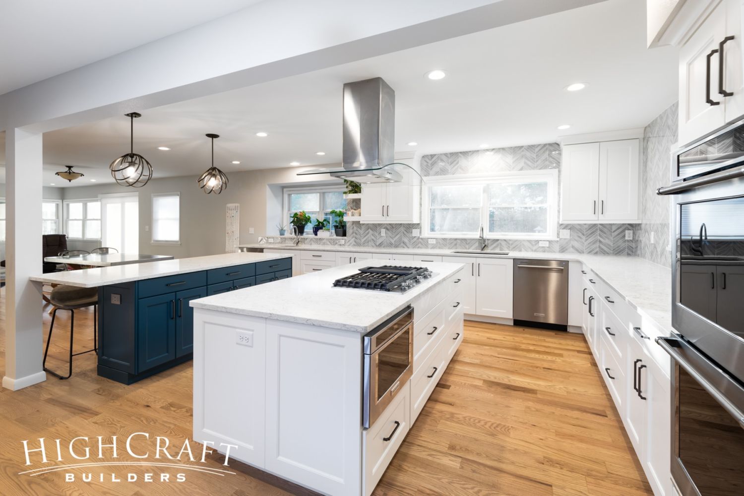 kitchen-remodel-two-islands-white-blue-gray-chevron-tile-accent-wall