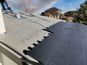 whole-house-remodel-back-exterior-solar-roof-installation