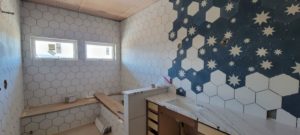 whole-house-remodel-master-bath-white-blue-star-hex-tile-sinks-shower