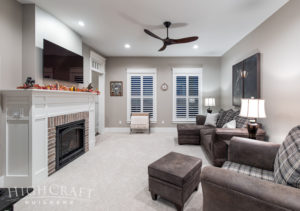 custom_home_builder_colorado_master_suite_sitting_area_natural_gas_fireplace