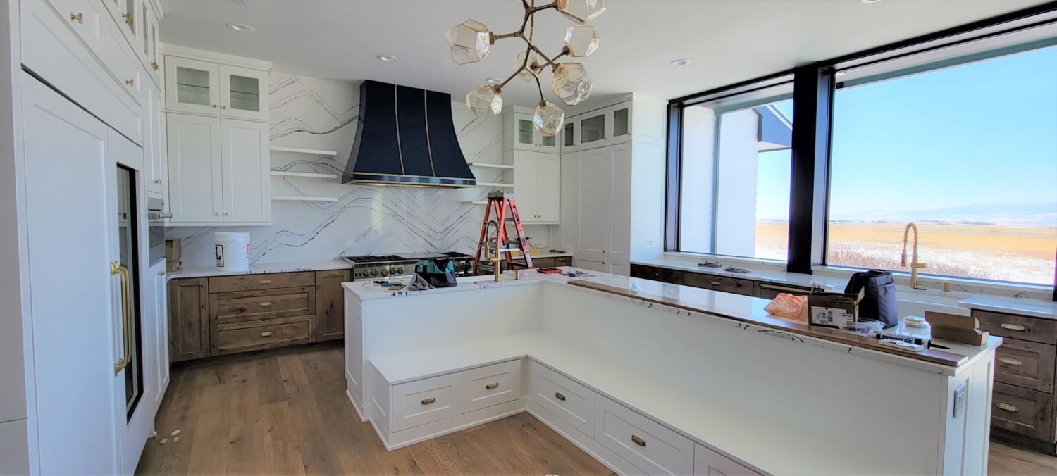 kitchen-remodel-navy-blue-range-hood-wood-perimeter-cabinets-in-progress