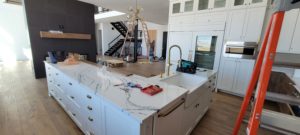 kitchen-remodel-quartz-countertop-apron-sink-dishwasher-in-progress