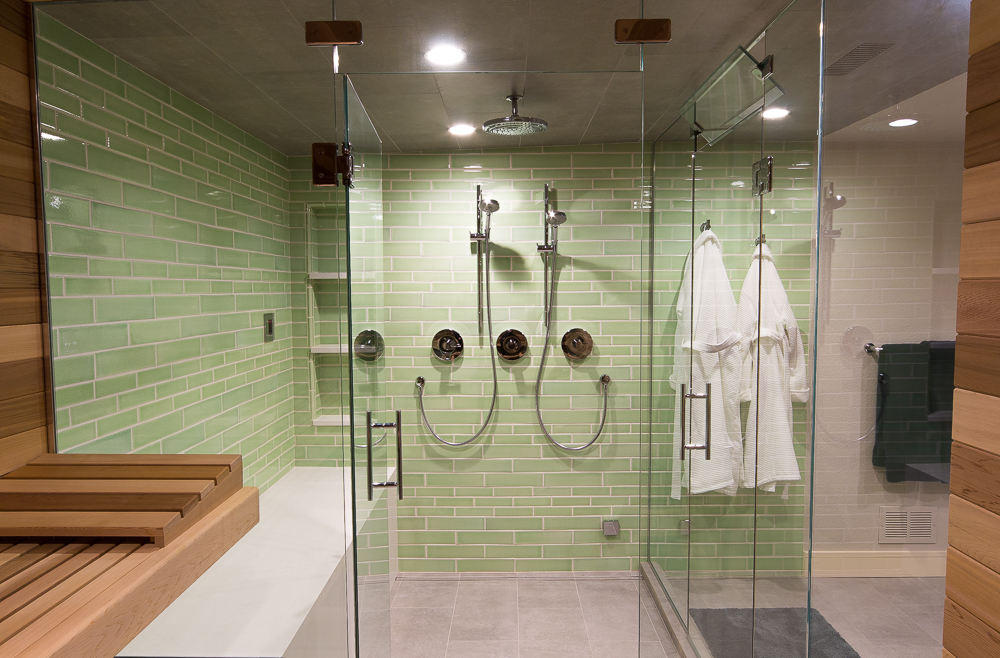 steam-shower-sauna-remodel-cedar-wood-glass-walls-green-tile-white-robes
