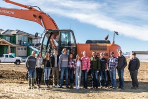 custom-home-groundbreaking-heron-lakes-orange-excavator-highcraft-team-and-family