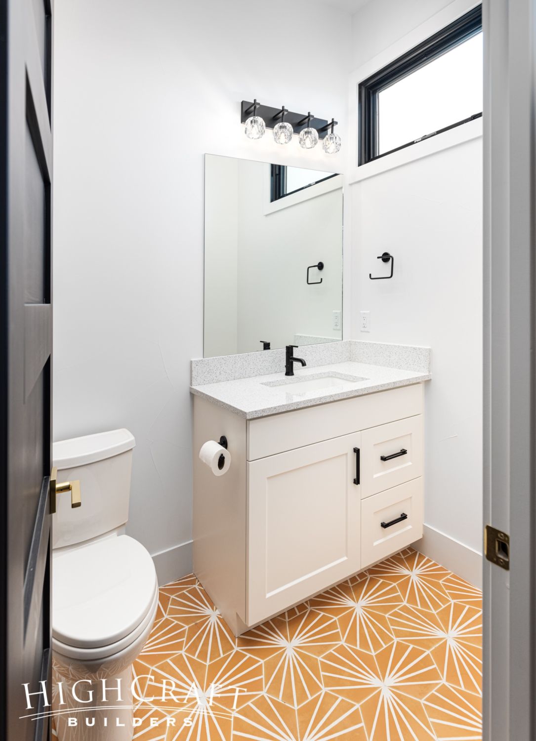 bathroom-remodel-orange-starburst-hex-tiles-sink