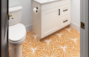 orange-starburst-hex-tile-bathroom-flooring
