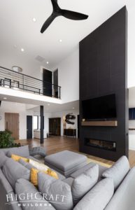 whole-house-remodel-black-monolith-fireplace-living-room