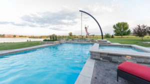 building-contractor-near-me-swimming-pool-girl-jumping-fort-collins-colorado