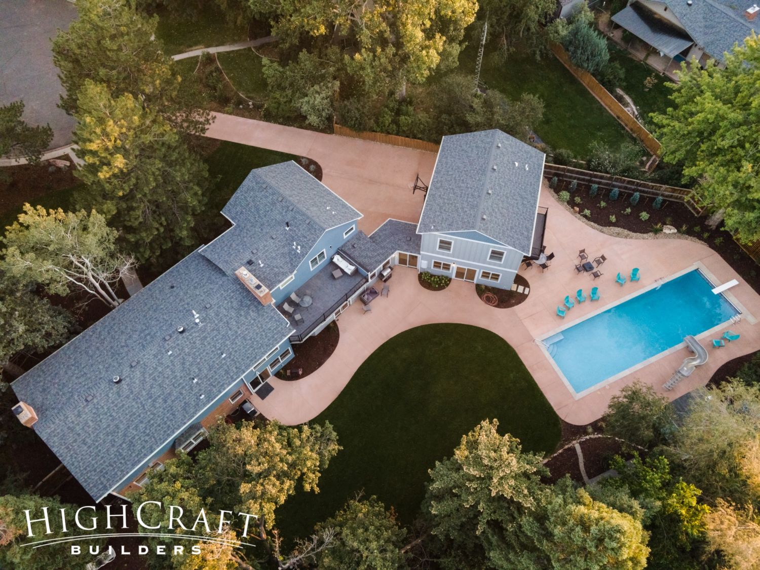 local-home-builder-near-me-pool-house-swimming-pool-concrete-deck-aerial-photo