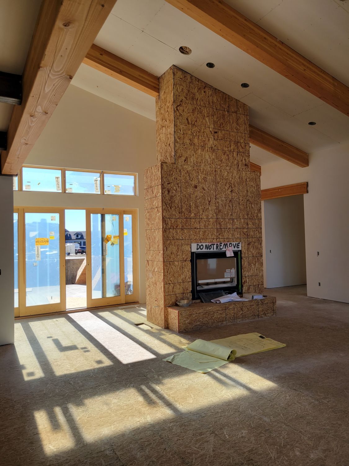 custom-home-builder-berthoud-co-great-room-fireplace-progress