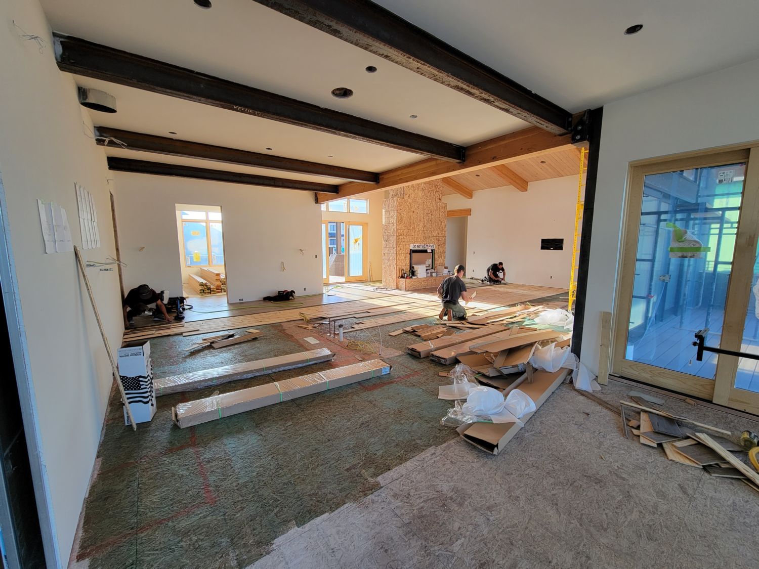 custom-home-builder-near-me-colorado-ranch-interior-great-room-flooring-installation