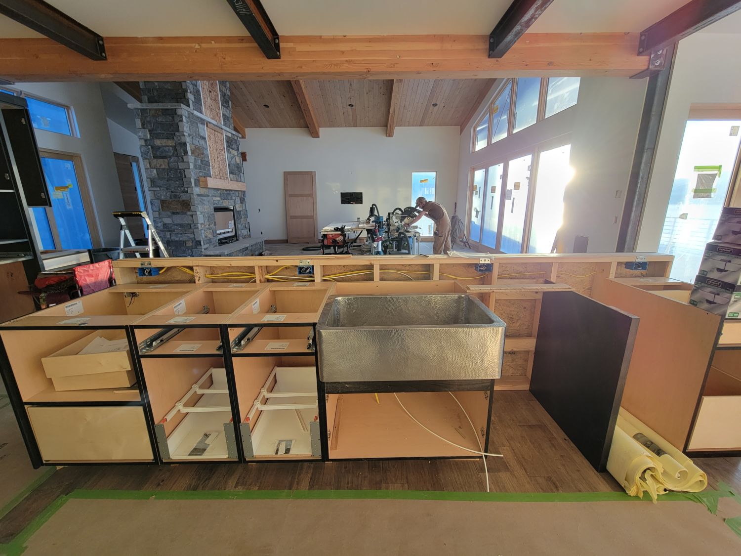 custom-home-builder-berthoud-kitchen-island-hammered-sink-progress