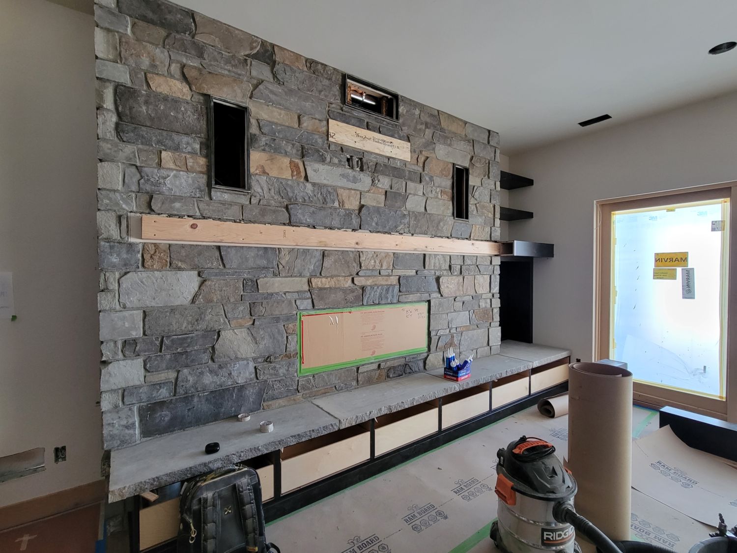 custom-home-builder-berthoud-rec-room-fireplace-progress