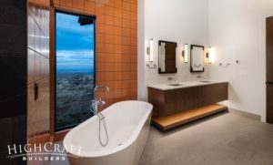 custom-home-builder-near-me-colorado-master-bathroom-modern-orange-tile-soaker-tub