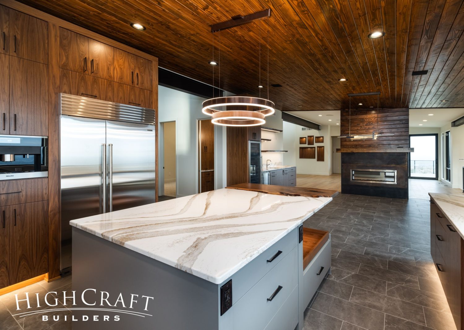 custom-home-builder-near-me-loveland-co-kitchen-center-island-tongue-and-groove-ceiling