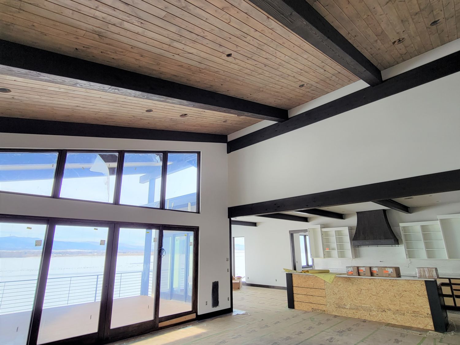 custom-home-builder-tongue-and-groove-ceiling-beams-progress-windows