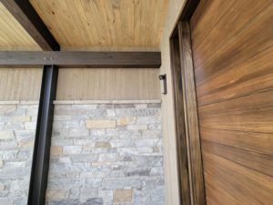 custom-home-front-entry-slab-door-siding-beams-progress