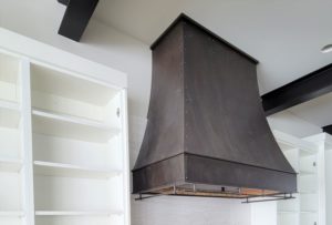 custom-home-metal-kitchen-hood-close-up-rivet-detail