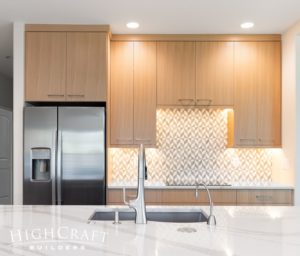 kitchen-remodel-near-me-white-oak-cabinets-tile-backsplash-sink-faucet