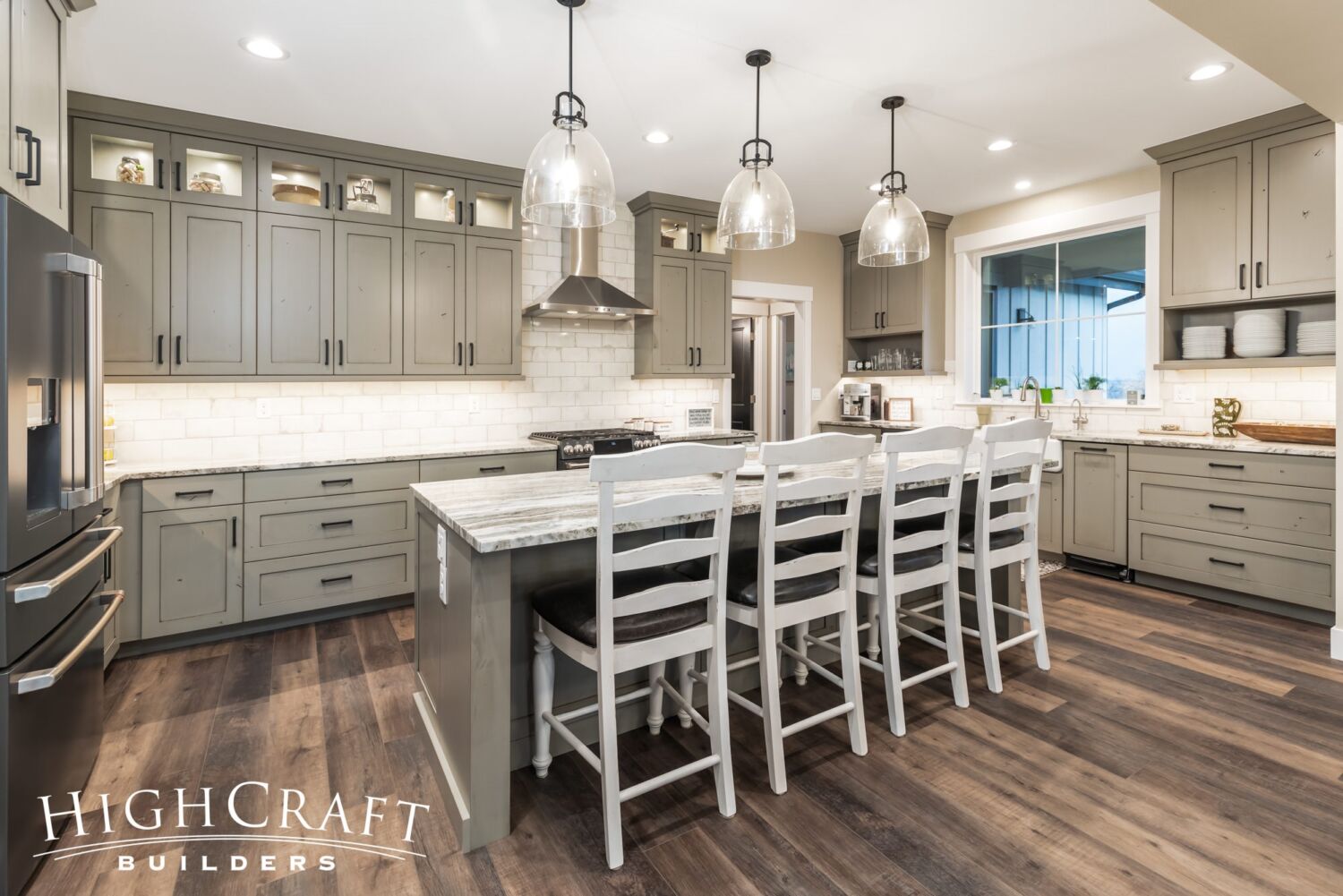 custom-home-kitchen-island-gray-green-cabinetry
