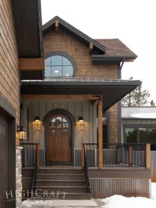 custom_home_construction_mountain_building_front_entry_exterior_round_windows