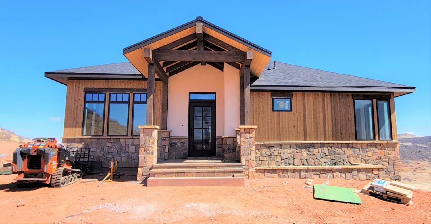 mountain-modern-custom-home-exterior-front-porch-progress
