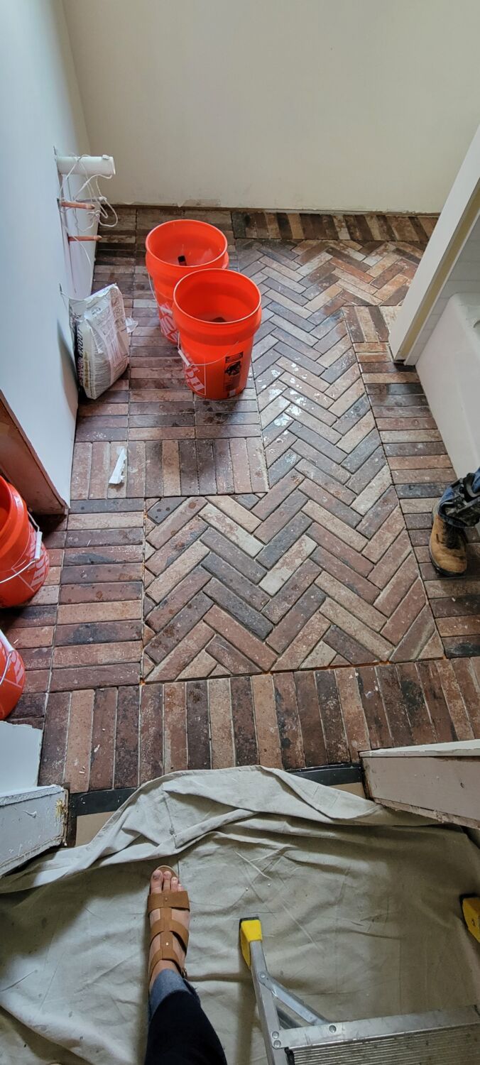 whole-house-remodel-hall-bathroom-brickstone-flooring-progress