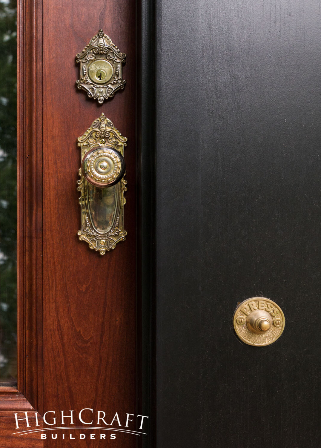 Gothic-Inspired-Old-Town-Exterior-Brass-door-hardware-and-door-bell-button