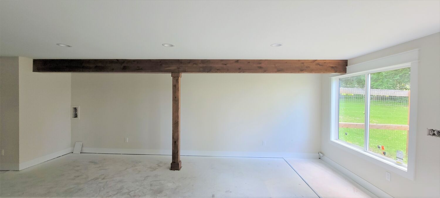 basement-remodel-drywall-progress-wrapped-beam