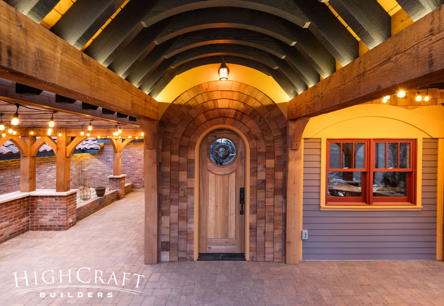 Eclectic-Remodel-in-Old-Town-Custom-Arched-Entry-Door-with-Curved-Trusses