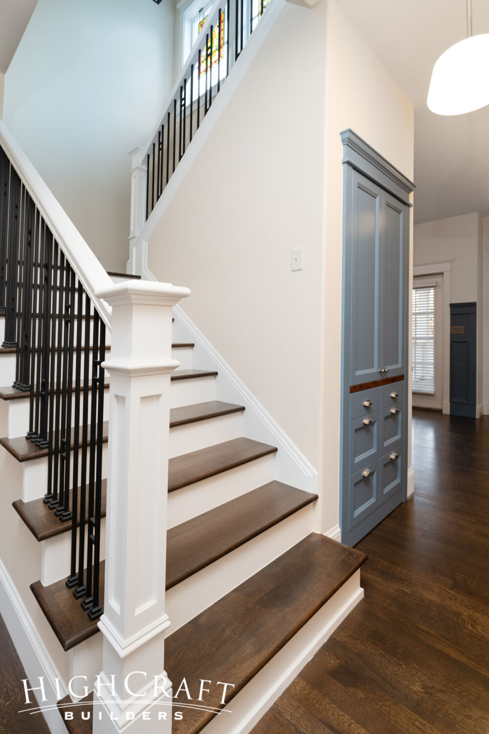 Eclectic-Remodel-in-Old-Town-Hardwood-Tread-Stairs-with-Painted-Risers