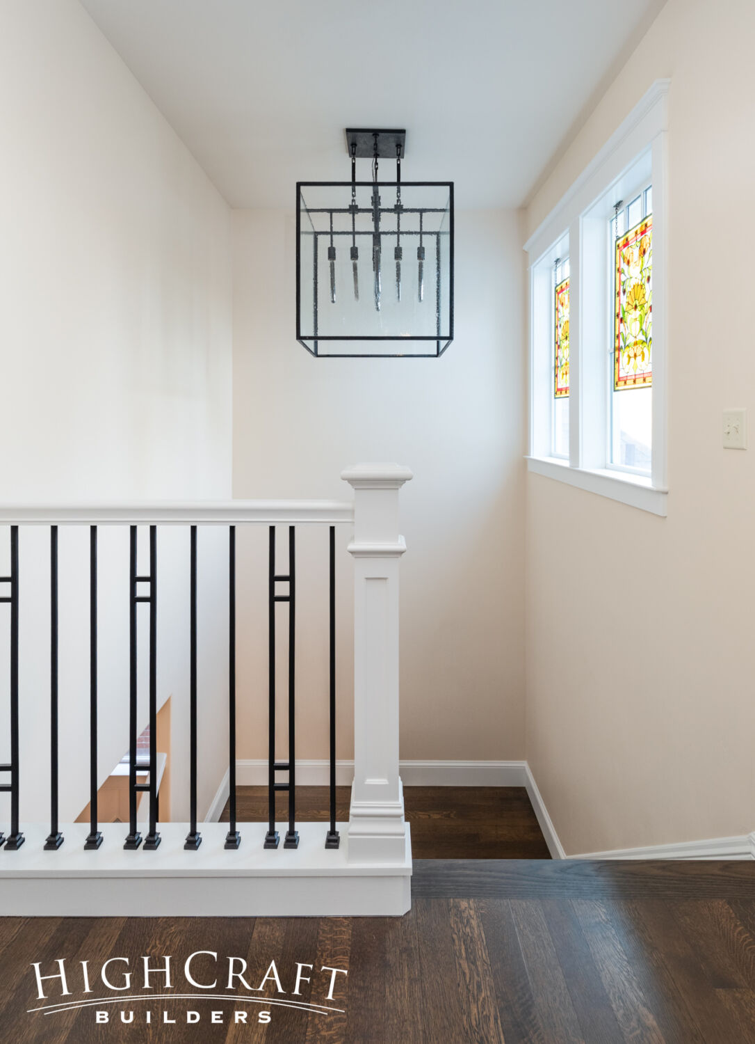 Eclectic-Remodel-in-Old-Town-Transisitonal-Stairwell-Pendant-Light