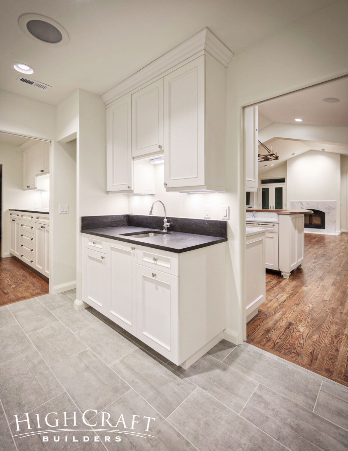 Kitchen-And-Great-Room-Addition-Wet-Bar-White-Cabinets-Mudroom-Tile-Hardwood-Floor