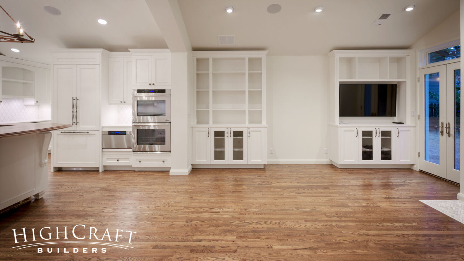Kitchen-And-Great-Room-Addition-White-Cabinets-Media-Center-Transitional-Oak-Floors