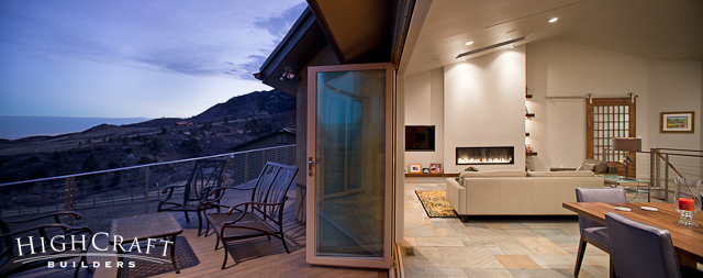 Modern-Mountain-Open-Concept-Livingroom-Dining-Deck-Stacking-Glass-Wall-Patio-Doors