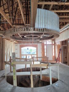curved-stairs-round-soffit-interior-framing-progress