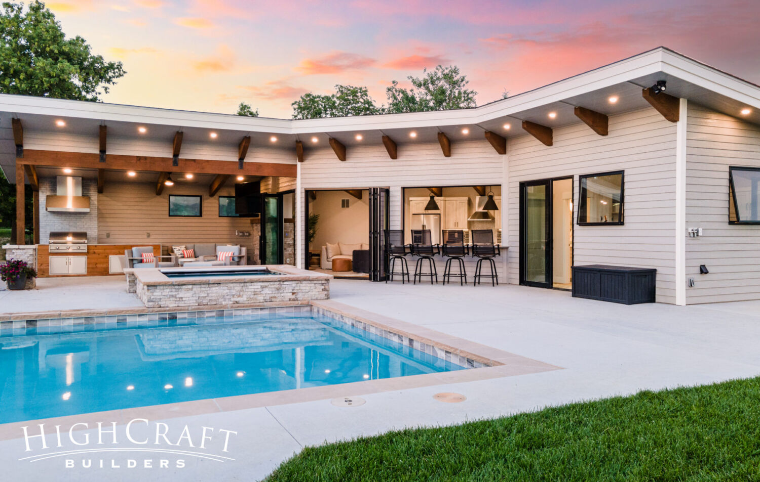 Contemporary-Pool-House-with-Indoor-Outdoor-Living-Custom-Soffit-Accent-Lighting