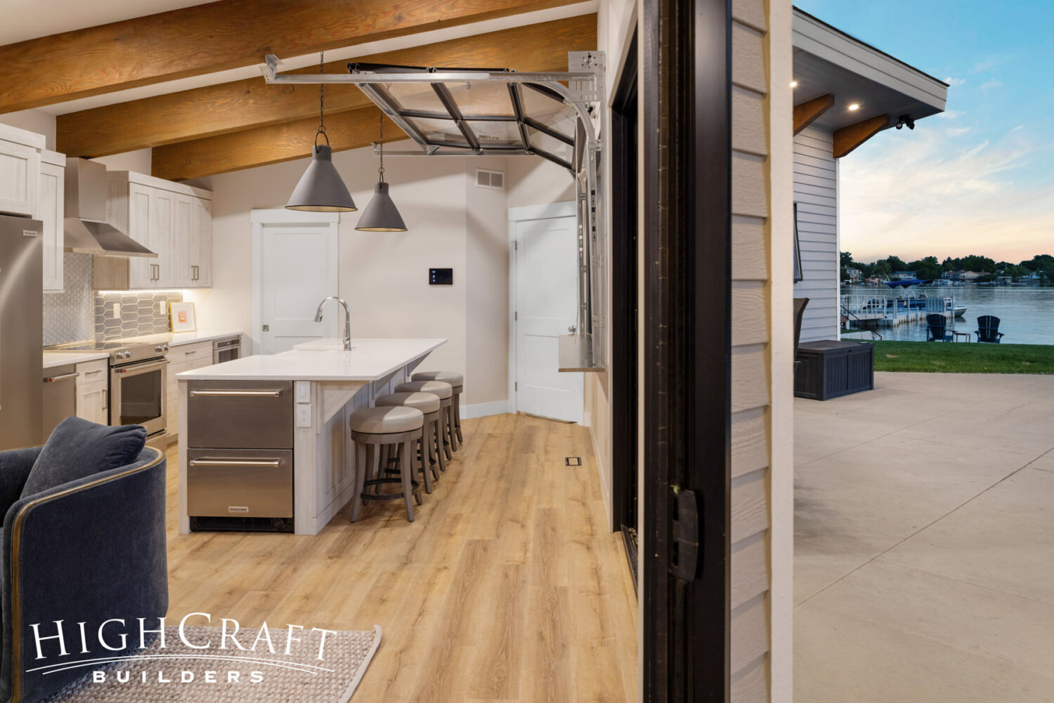Contemporary-Pool-House-with-Indoor-Outdoor-Living-Garage-Door