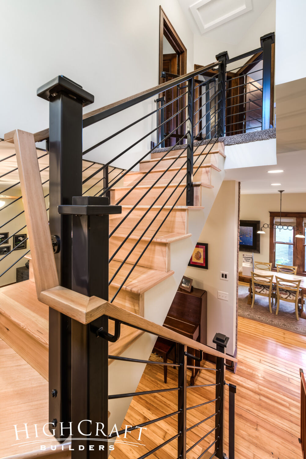 Historic-Second-Story-Addition-Wood-Stairs-Black-Metal-Cable-Railing