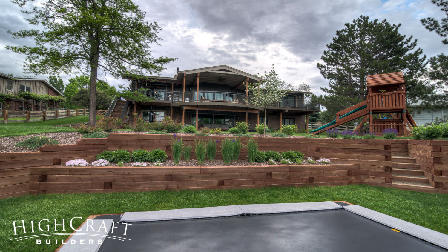 Outdoor-Living-And-Interior-Remodel-Dream-Family-Backyard-Custom-Deck-Patio-Garden-Bed