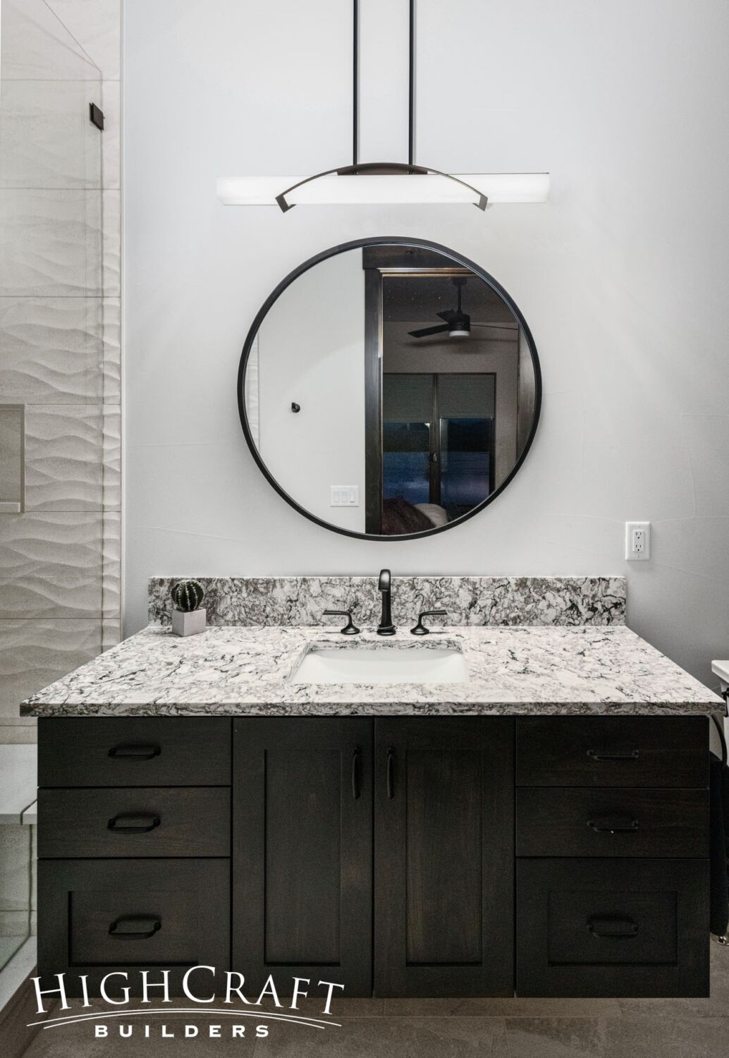 custom-home-builder-guest-bathroom-vanity-circle-mirror