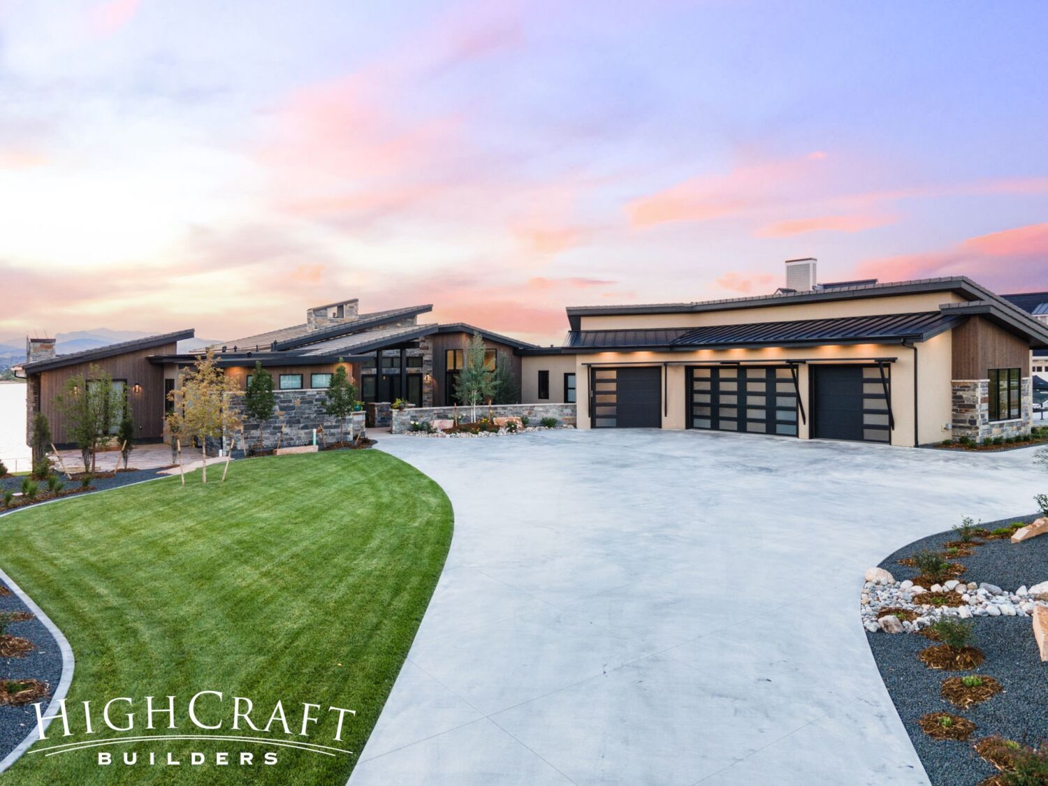 custom-home-builder-near-me-berthoud-exterior-aerial-front-garage-lighting