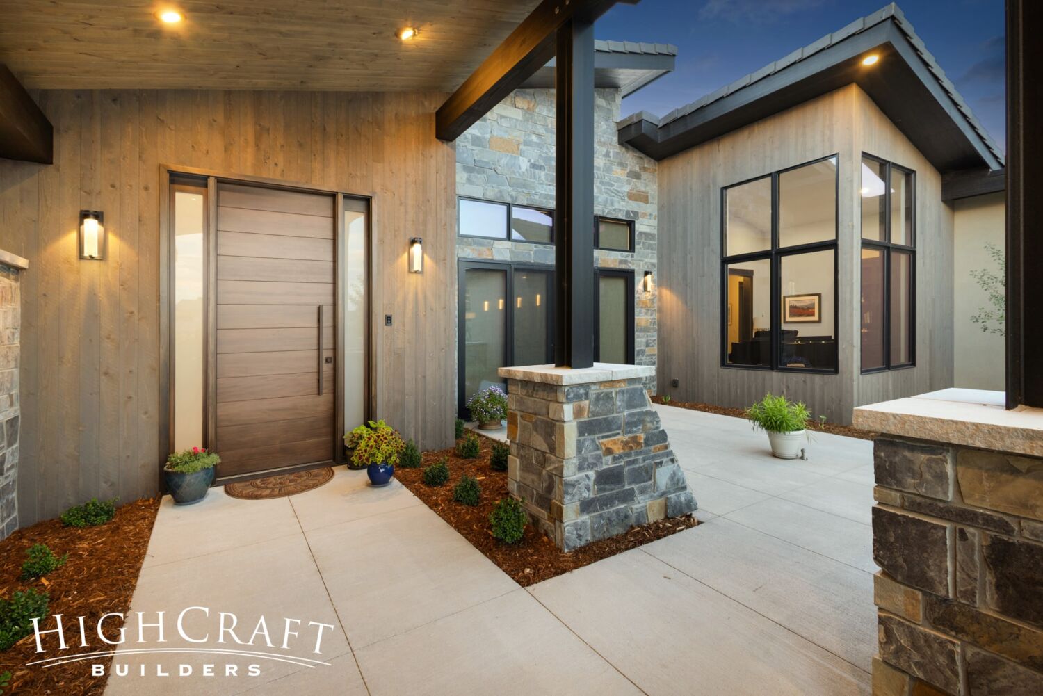 custom-home-builder-near-me-berthoud-exterior-front-entry-courtyard